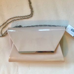 Patent beige clutch